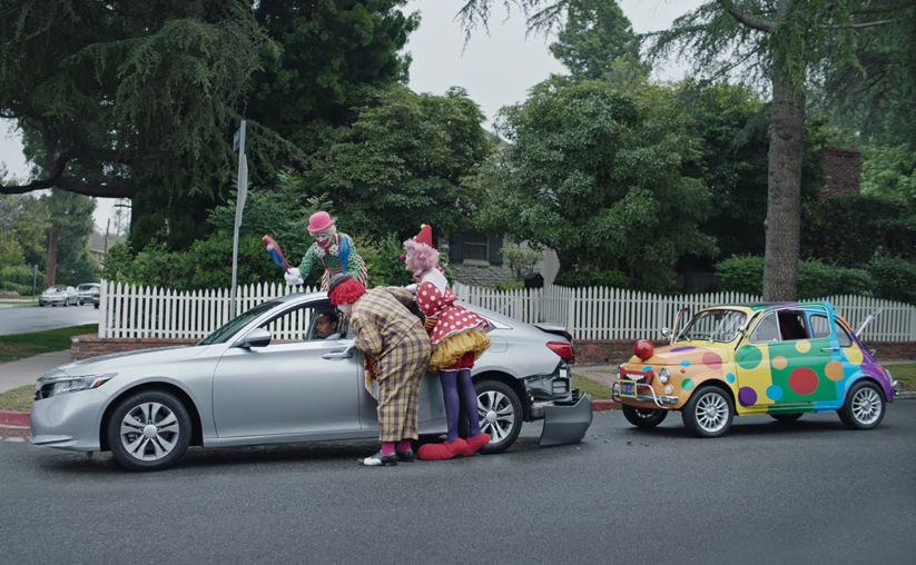 Farmers auto insurance clown car accident